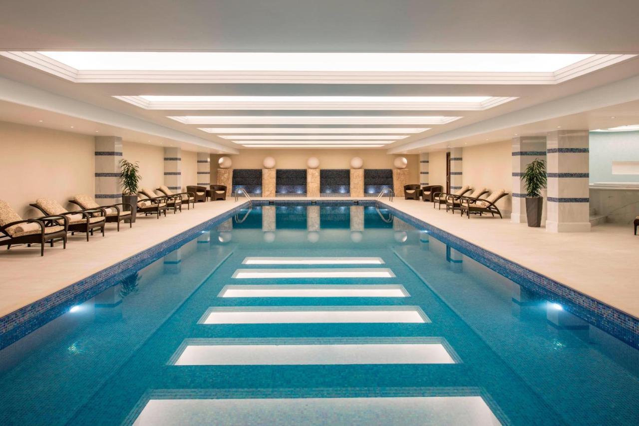 Sheraton Oman Hotel Muscat Exterior photo The swimming pool at the Four Seasons Hotel