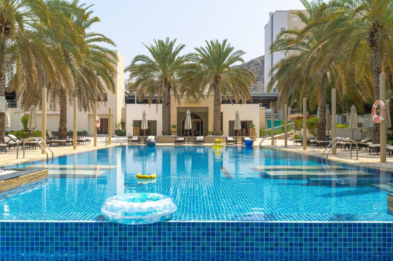 Sheraton Oman Hotel Muscat Exterior photo The swimming pool at the Jumeirah Beach Hotel