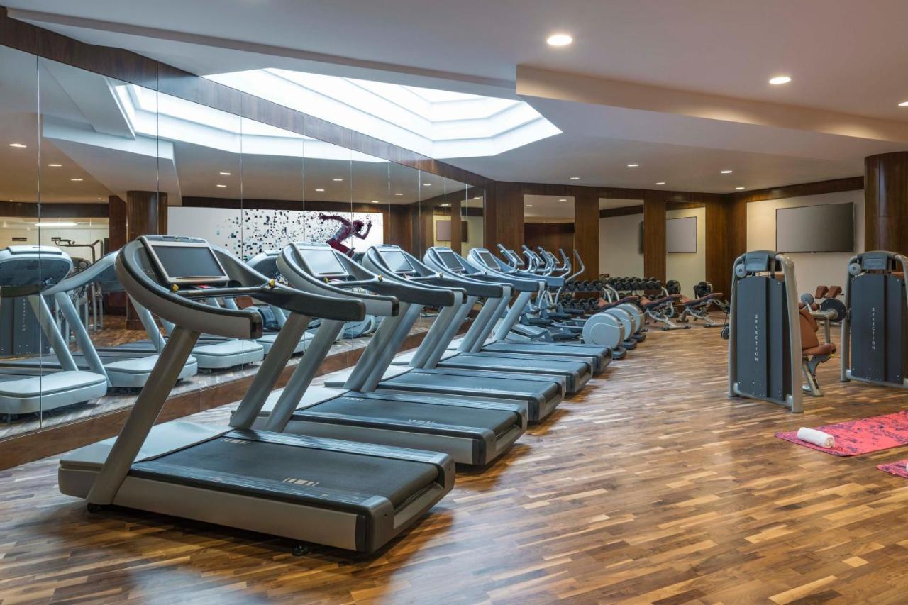 Sheraton Oman Hotel Muscat Exterior photo A row of treadmills