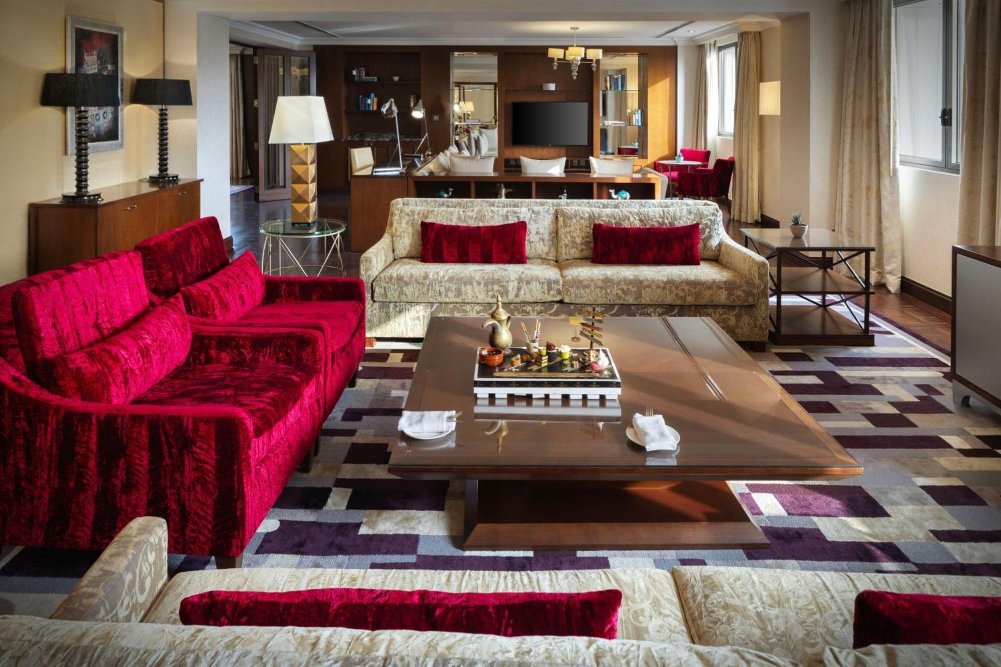 Sheraton Oman Hotel Muscat Exterior photo The living room of a suite at the Mandarin Oriental, Munich